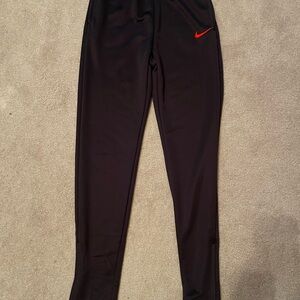 Nike Kids Black Joggers with Red Swoosh